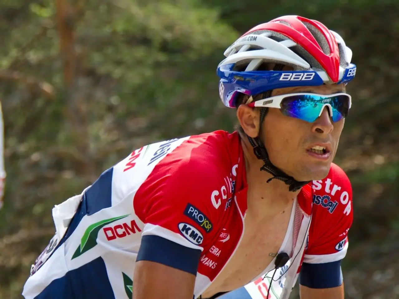 This is a man wearing goggles and helmet, these are trees.