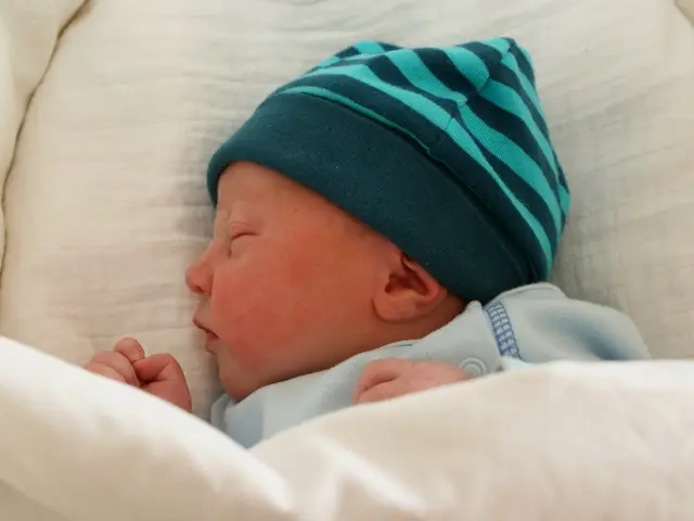 When does infant sleep consistently throughout the night?