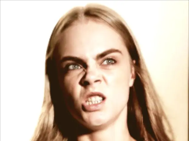 In this image there is a woman.